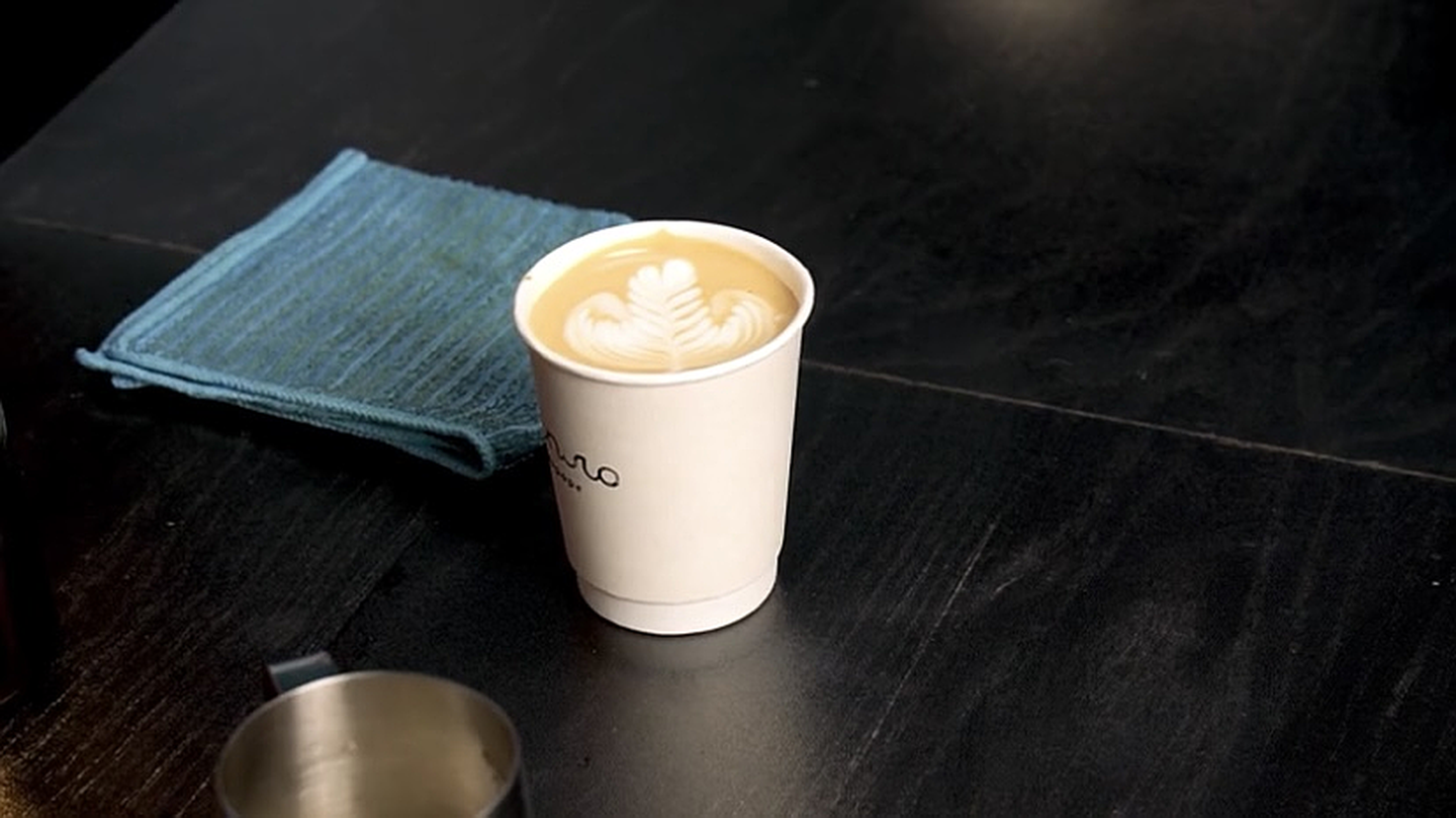 Latte art in take-away glasses